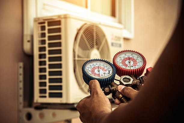 Professional Heat Pump Repair technician working in Ripon, WI